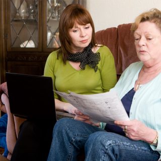 Mother and daughter working on a budget