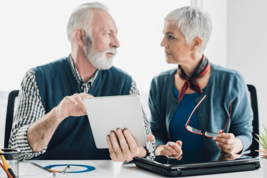 Seniors discussing annuity for retirement