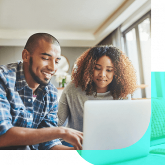 Couple looking at laptop