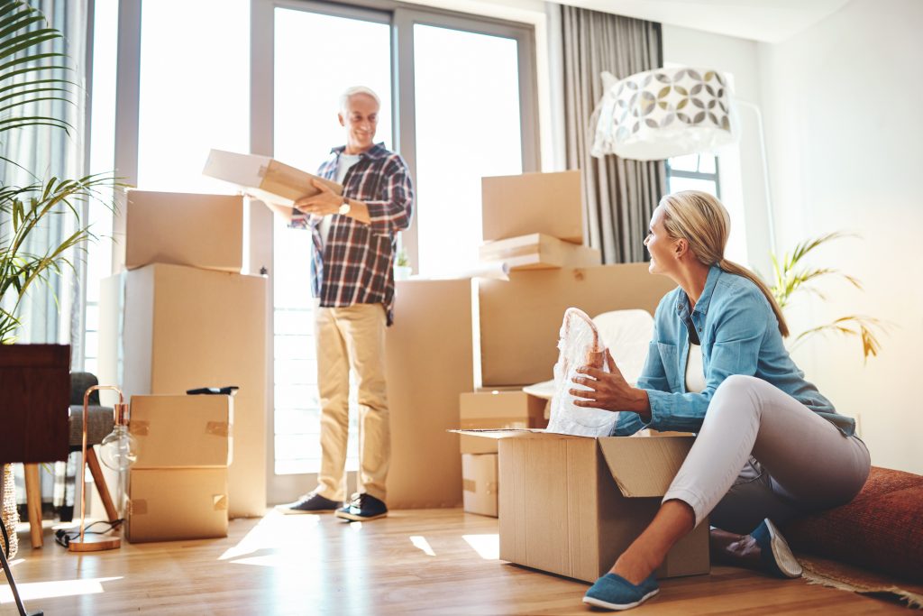 Couple packing their house