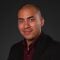 Headshot of Michael Santiago, senior editor for Annuity.org