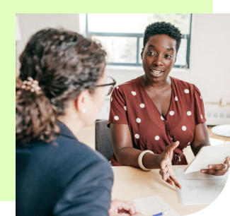 Woman having discussion with financial advisor