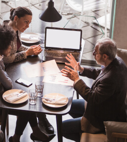 people consulting over a computer