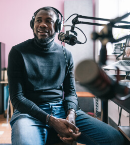 Person recording a podcast