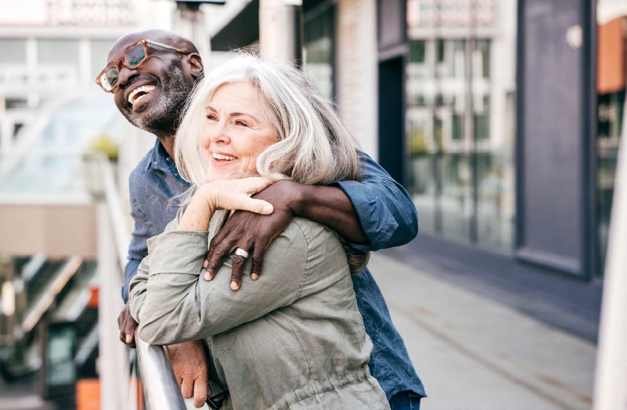 Adult couple hugging