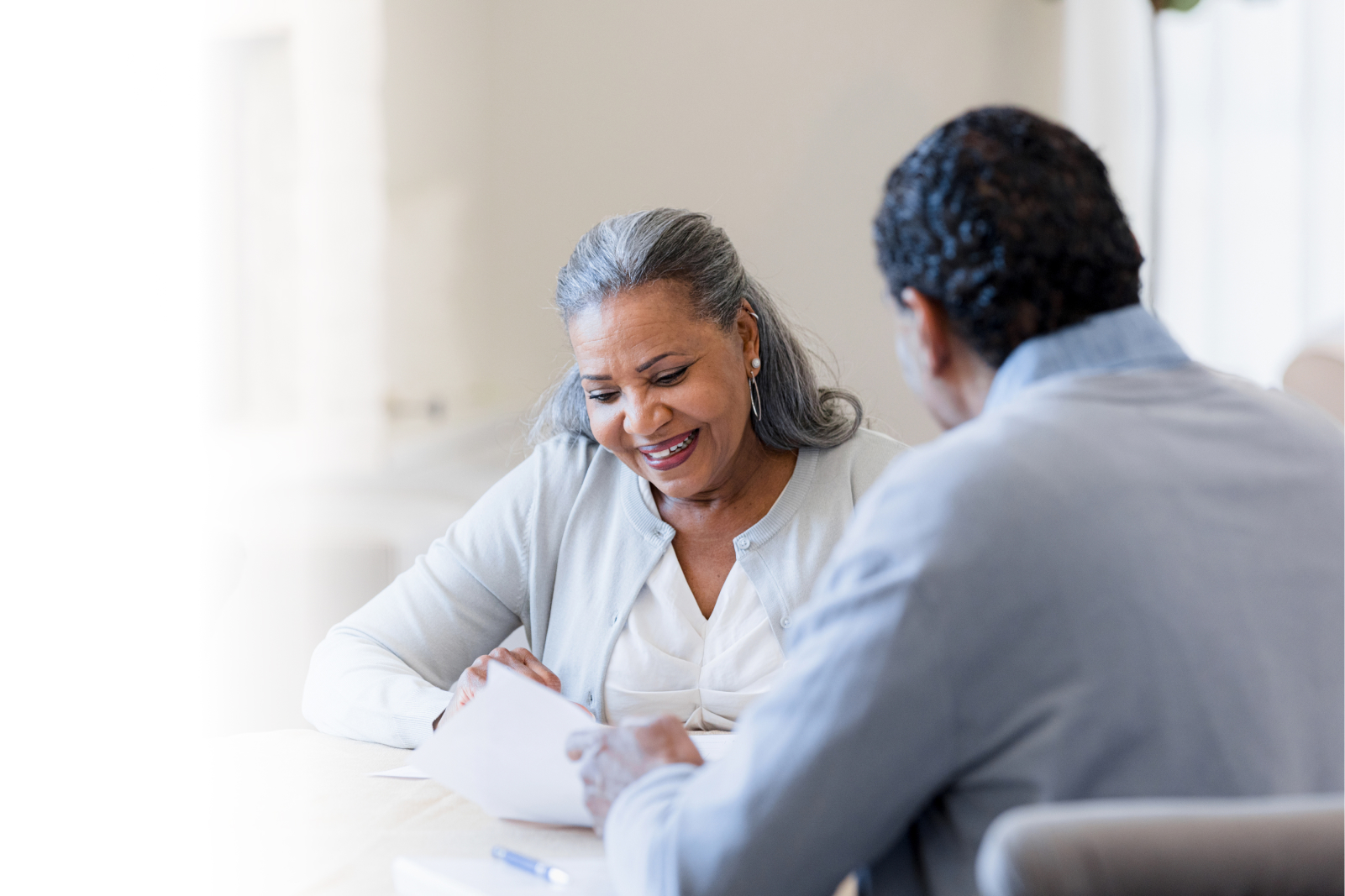 Woman Talking With Financial Advisor