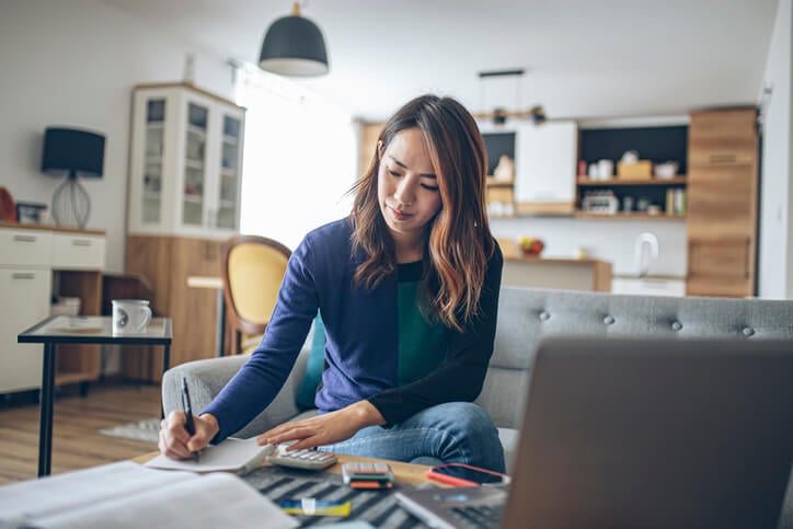 Woman looking at tax papers