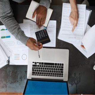 Laptop with paperwork