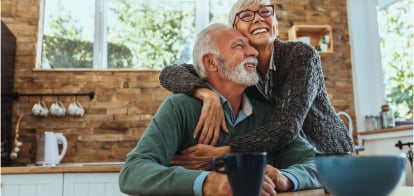 Retired couple embracing