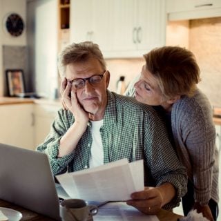 Older couple reviewing their finances