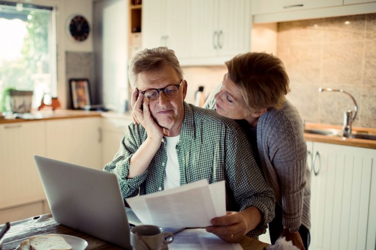 Older couple reviewing their finances