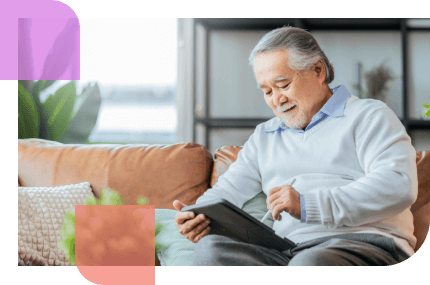 Older man researching his options for care and customization through annuity riders