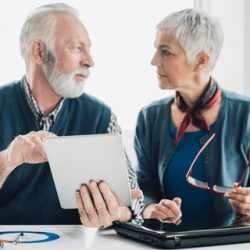 Seniors discussing annuity for retirement