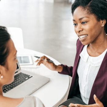 Woman meets with financial advisor