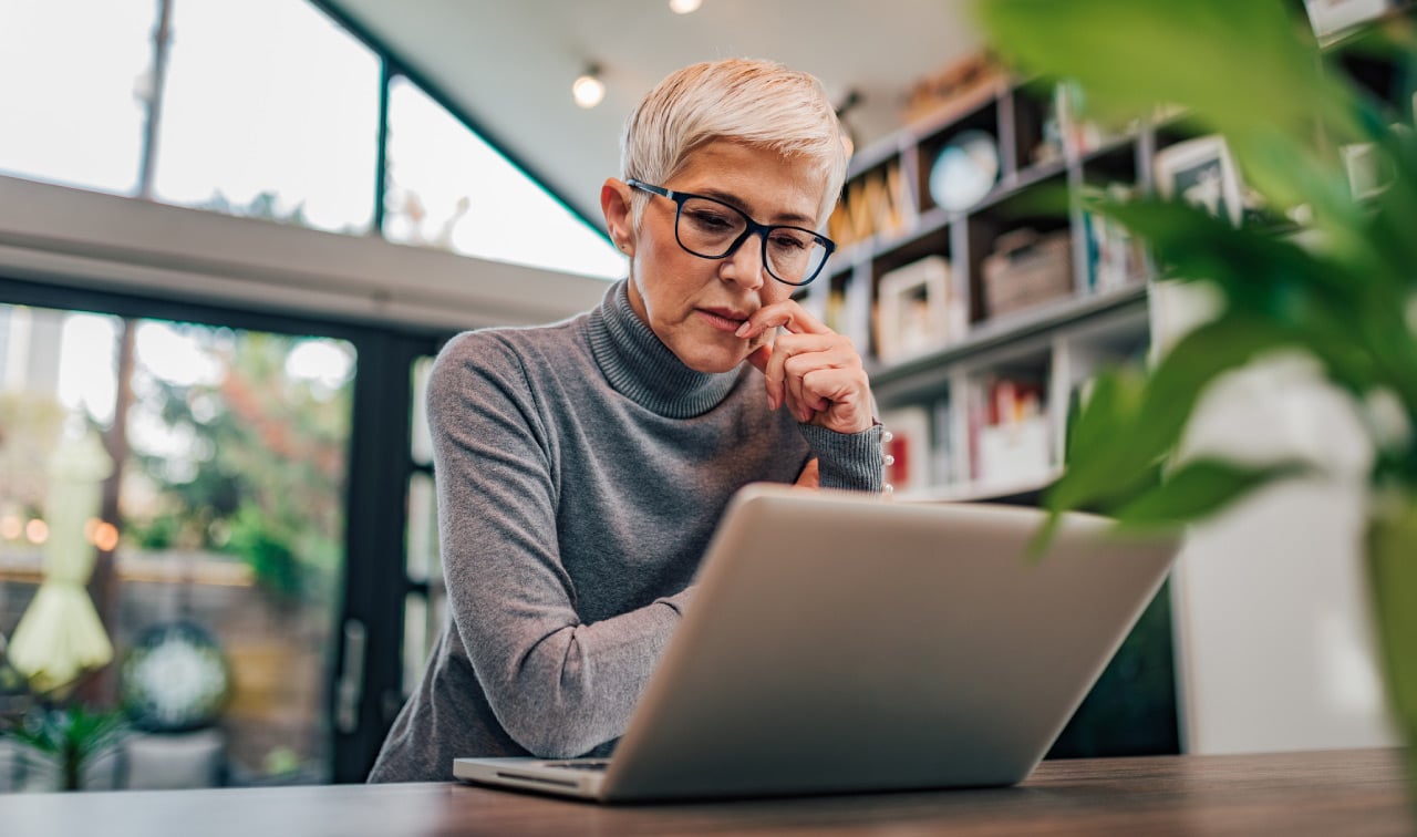 Image of a woman contemplating her digital legacy