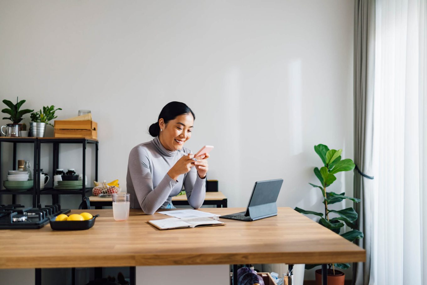 Woman smiling using phone